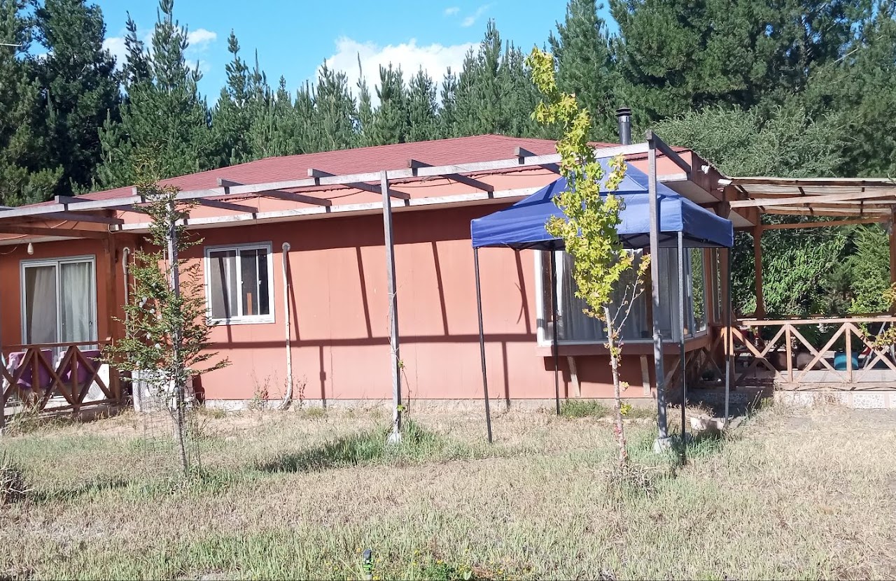 Parcela de agrado con casa y cabañas