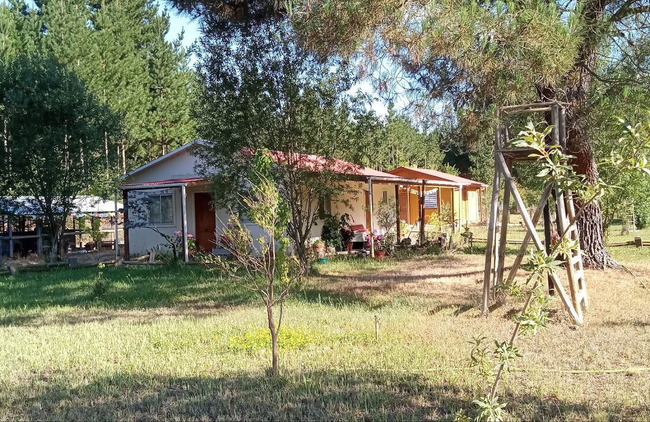 Parcela de agrado con casa y cabañas