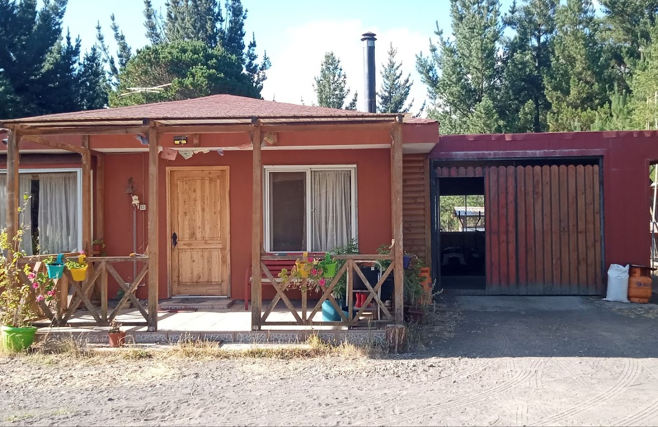 Parcela de agrado con casa y cabañas