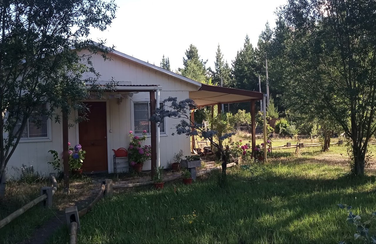Parcela de agrado con casa y cabañas